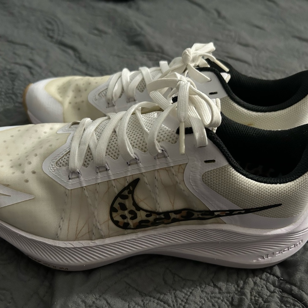 White and Leopard Athletic Shoes with Mesh Upper and Cushioned Sole
